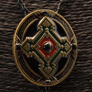 Western bolo tie with Indian design in the color copper