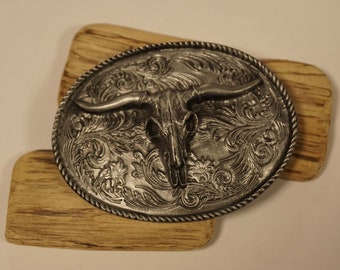 Belt buckle bull skull on ornate shield