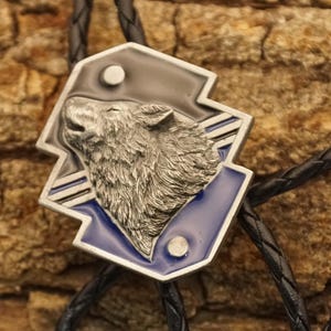 Bolo tie wolf howling at full moon