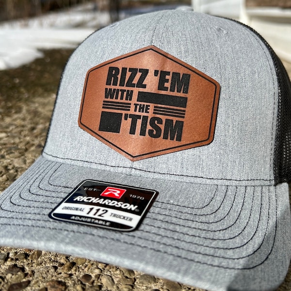 Rizz ‘Em With The Tism Funny For Him/Her Gag Gift Leather Patch Trucker Hat