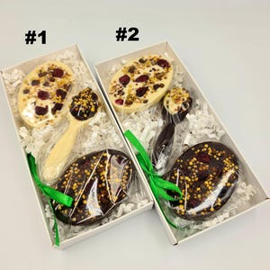 Hantverksmässiga bibrödchoklader: Tranbärs- och vitchokladpresentförpackning