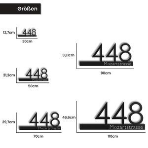 May include: Black house number sign with the number 448 and the street name Mozartstrasse. The sign is available in three sizes: 30cm x 12.7cm, 50cm x 21.2cm, and 70cm x 29.7cm.