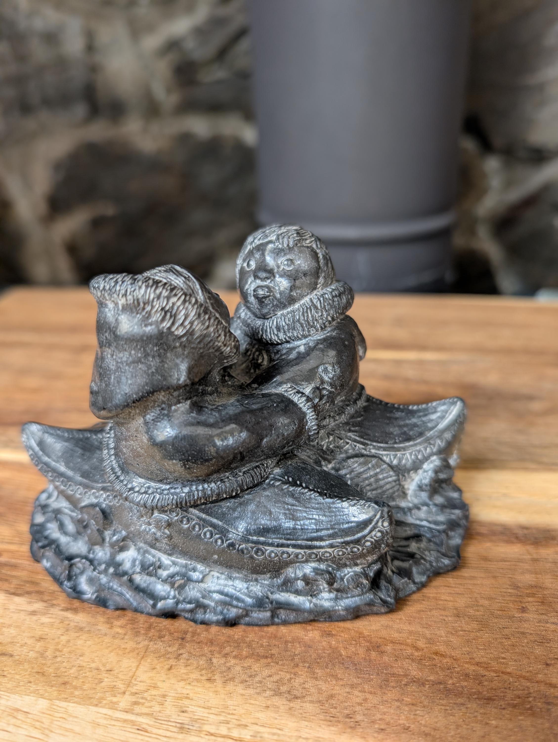 Vintage Wolf Original Sculpture of Inuit Man & Woman in Canoes