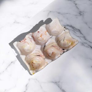 Egg storage boxes. Made from jesmonite, egg boxes