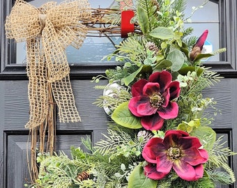 Artificial rustic Christmas door wreath.