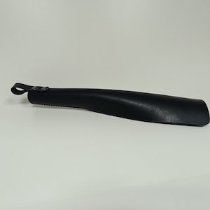 Handmade black leather paddle