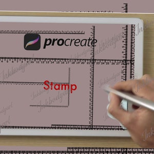 May include: A white tablet with a gray screen displaying the Procreate app logo and the word "Stamp" in red. A hand is holding a stylus over the screen.