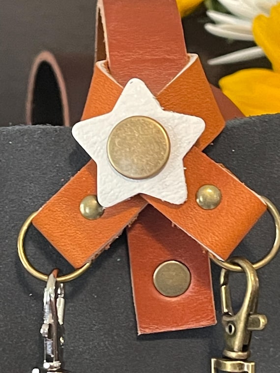 Double loop flair holder to hold 2 separate charms to your PLG Portland Leather Goods Bags Full grain honey tan leather Purse charm keychain