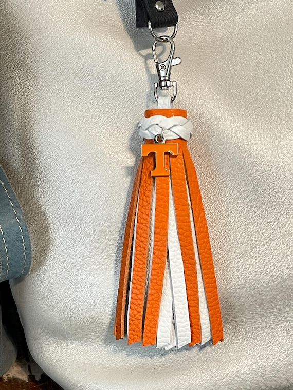 University of Tennessee Volunteers football white orange leather sports tassel. Purse flair, backpack charm, bag bling PLG Portland leather