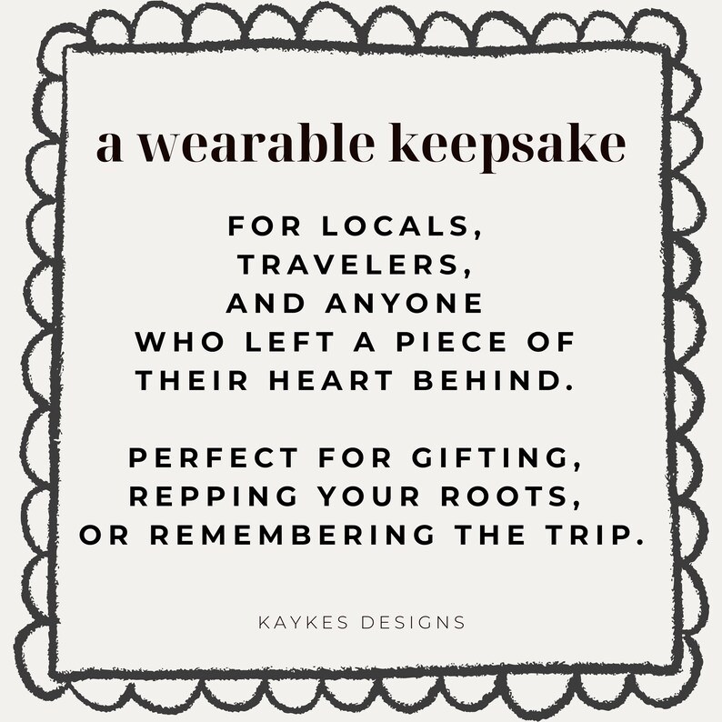 May include: A cream-colored square graphic with a black border and text that reads "a wearable keepsake" and "FOR LOCALS, TRAVELERS, AND ANYONE WHO LEFT A PIECE OF THEIR HEART BEHIND." The graphic also says "KAYKES DESIGNS."