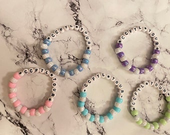 Pulseras de la gira de Nessa Barrett del Club de la Iglesia para los Solitarios