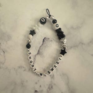 Short N Sweet by Sabrina Carpenter Phone Charm