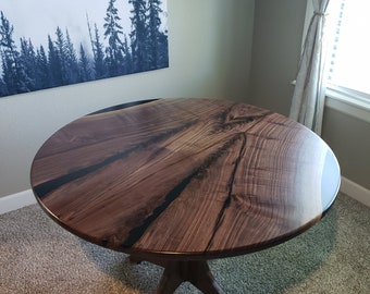 Solid handcrafted round walnut dining table