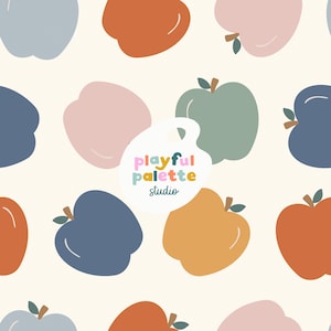 May include: A repeating pattern of stylized apples in various colors, including blue, orange, pink, and green, against a cream background. The design features a playful, modern aesthetic. The text "playful palette studio" is also visible.