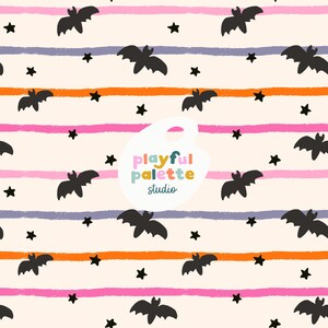 May include: A repeating pattern featuring black bats and stars on a cream background. Horizontal stripes in orange, pink, and blue add color. The text "playful palette studio" is in a white shape.