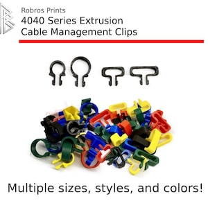 以下が含まれることがあります： さまざまな形とサイズのマルチカラーケーブル管理クリップのコレクション。画像には「Robros Prints 4040 Series Extrusion Cable Management Clips. 複数のサイズ、スタイル、色！」というテキストが含まれています。