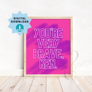 以下が含まれることがあります： ピンクとパープルのデジタルプリントで、白いテキストに「You're Very Brave, Ken.」と書いてあります。
