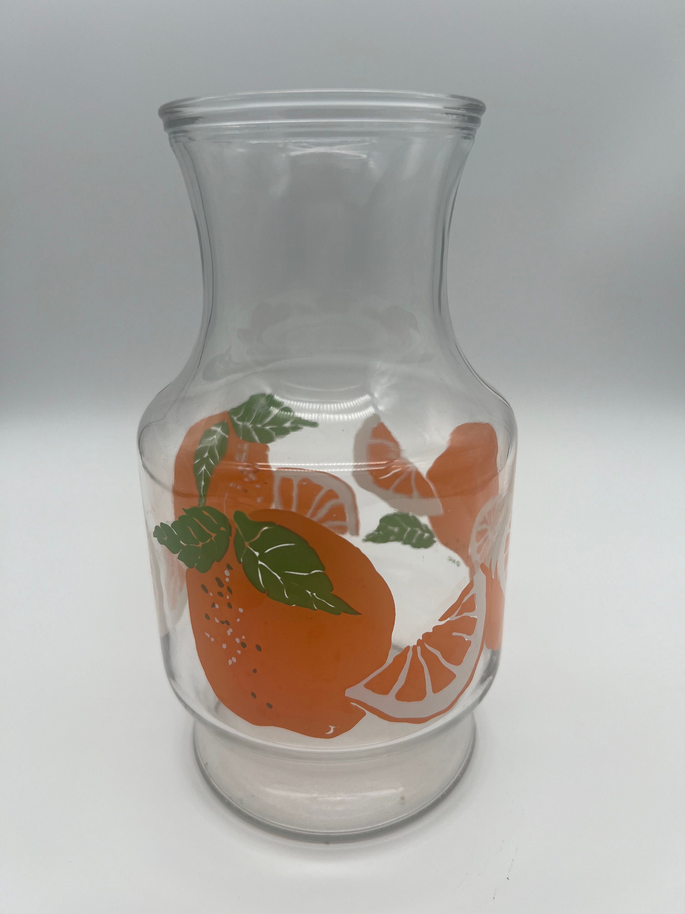 Orange juice flower vase from . Link in bio🤍 #quinaeemani #vira