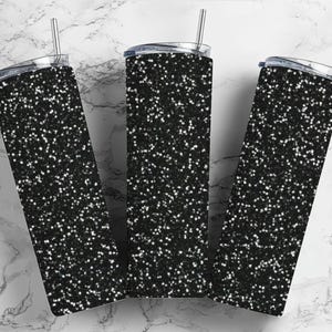 May include: Three black glitter tumblers with lids and straws. The tumblers are made of stainless steel and have a black glitter finish.