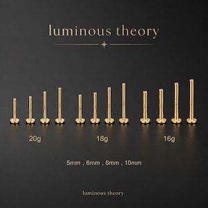 May include: A collection of gold-colored flat back labret studs arranged by gauge and length. The text luminous theory appears at the top and bottom. Labels indicate 20g, 18g, and 16g gauges, with lengths of 5mm, 6mm, 8mm, and 10mm displayed below.