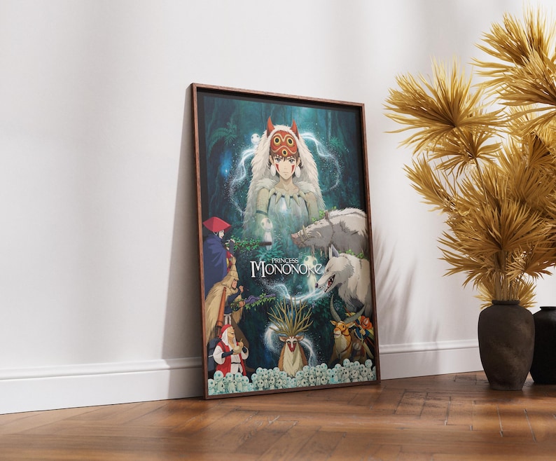 K&ouml;nnte beinhalten: Gerahmter Kunstdruck mit einer detaillierten Illustration aus dem Animationsfilm "Prinzessin Mononoke". Das Kunstwerk zeigt eine zentrale Figur mit langen wei&szlig;en Haaren und einem Wolf, umgeben von Waldlandschaft und anderen Charakteren. Der Titel "Prinzessin Mononoke" ist zu sehen.