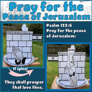 May include: A paper craft featuring a white brick wall with the text "Pray for the Peace of Jerusalem." The craft includes a Star of David flag and praying hands. The text "They shall prosper that love thee" is also present.