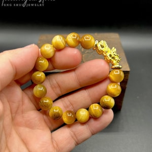 Bracciale Pixiu Occhio di Tigre Dorato: ciondolo placcato oro 24 carati, gioiello Feng Shui, perline da 10 mm