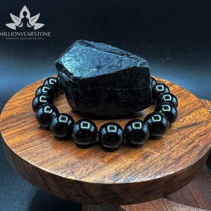 Handgefertigtes Armband aus schwarzem Obsidian: Minimalistischer Schutzedelstein, 10 mm gefädelt