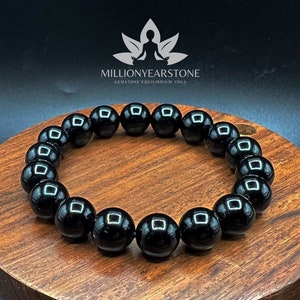 AAA+ Black Obsidian Luxury Bracelet: Elevate your style with our sleek 10mm Black Stone bracelet. High-quality Obsidian wristwear . Handmade