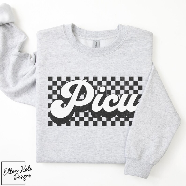 May include: A gray sweatshirt with a black and white checkered pattern and the word "Picnic" in a retro font.