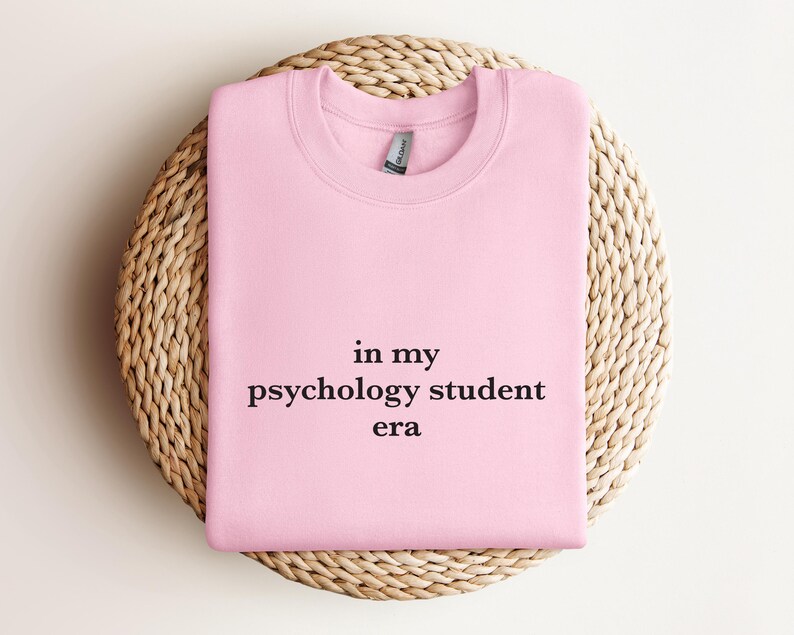 a pink t - shirt that says in my psychology student era