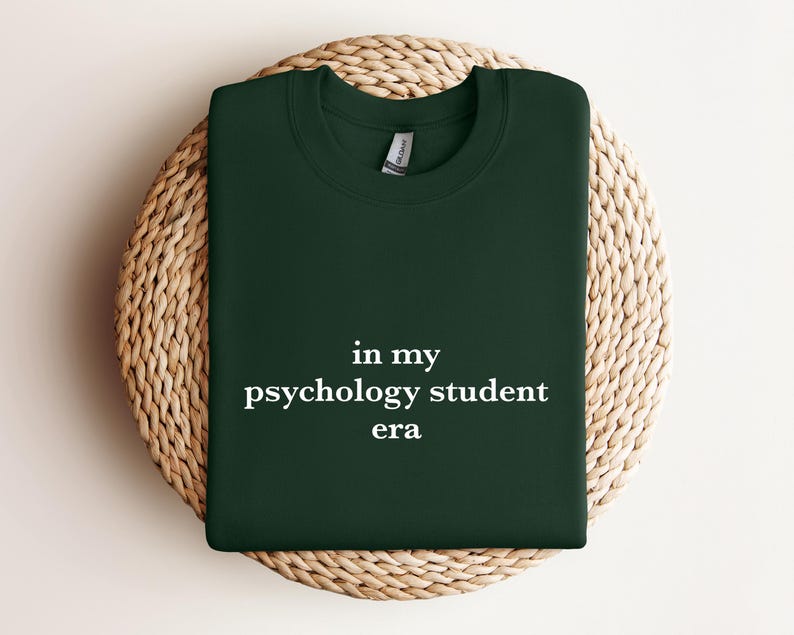 a green t - shirt that says in my psychology student era