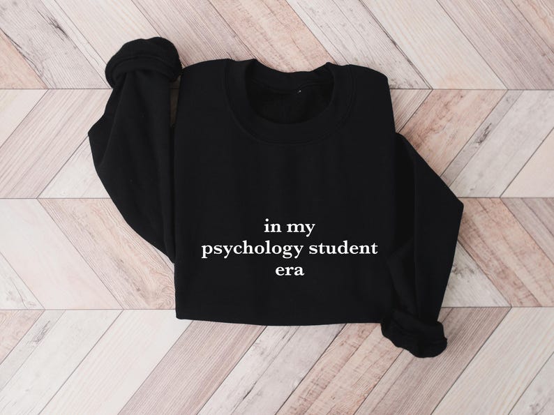a black shirt that says in my psychology student era