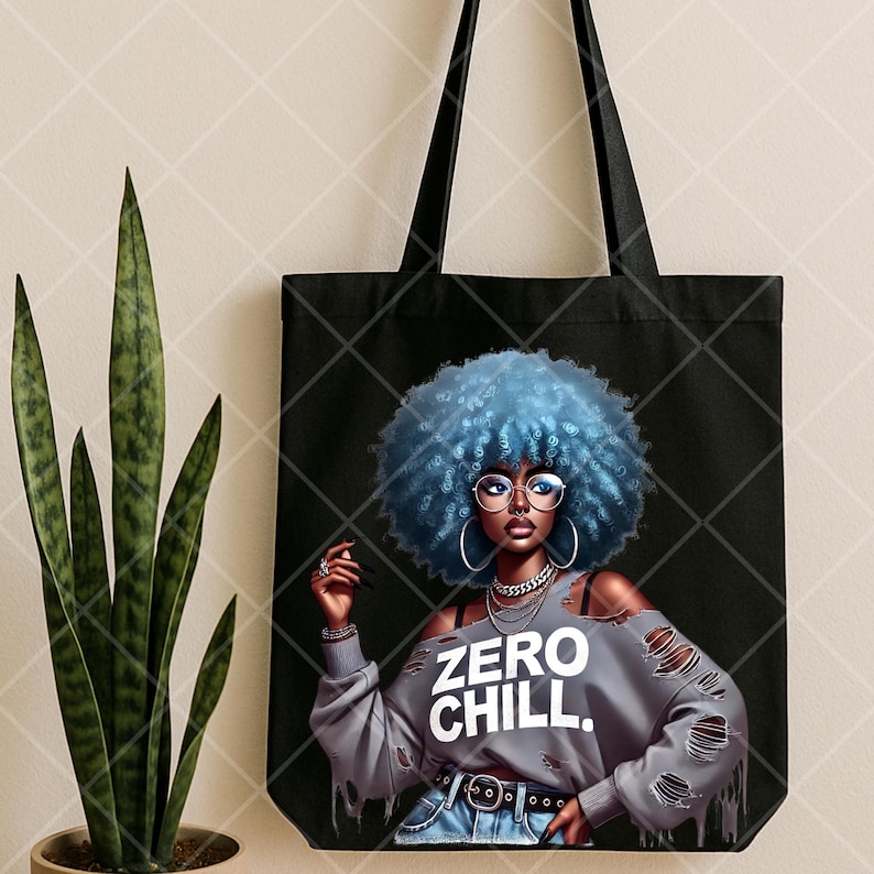 May include: Black tote bag featuring a graphic of a woman with blue hair, glasses, and the text "ZERO CHILL." The woman is wearing a gray distressed sweatshirt and jeans. The bag has black handles and is likely made of canvas or a similar material.