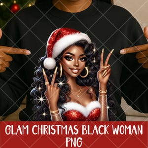 May include: Black sweatshirt featuring a glamorous illustration of a Black woman wearing a Santa hat and a red sequined top. The image includes the text "GLAM CHRISTMAS BLACK WOMAN PNG" in a red banner at the bottom.