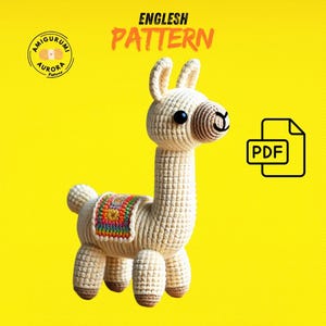 May include: Crochet pattern for a cute llama amigurumi toy. The pattern is in English and comes as a PDF download. The llama is beige with a colorful saddle and has a friendly expression.