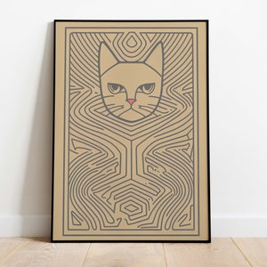 Puede incluir: Una impresión enmarcada de la cara de un gato estilizado en un patrón geométrico. La cara del gato está delineada en negro y el patrón está en tonos de gris y beige.