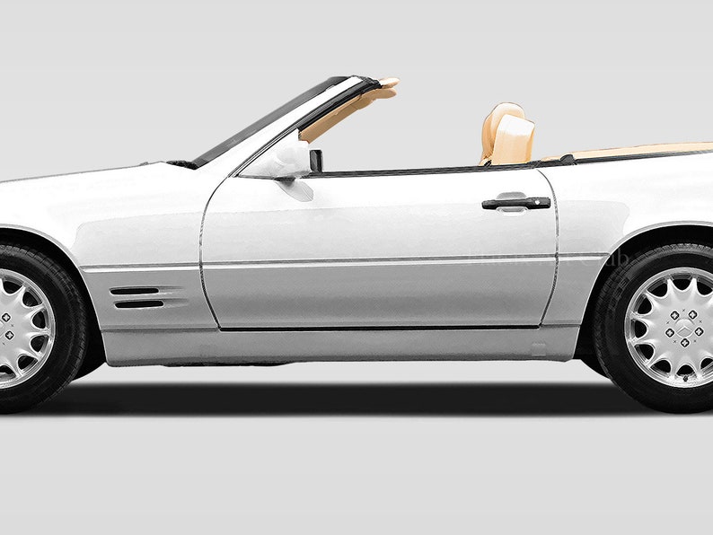 May include: A white convertible car with the top down. The car has a tan interior and is parked on a gray background.