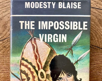 Very good First Edition copy of ‘The Impossible Virgin’ by Peter O’Donnell’ in a very good dust jacket.