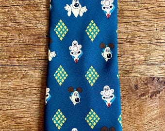 Fab vintage men’s necktie with a Wallace & Gromit theme.