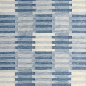 Hand woven flat weave rugs. Modern Scandinavian design rugs with blend of light and dark blue color to give a minimalist texture.