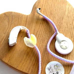 Plastic protective 30cm long cable (purple) for the protection of hearing implants and hearing aids