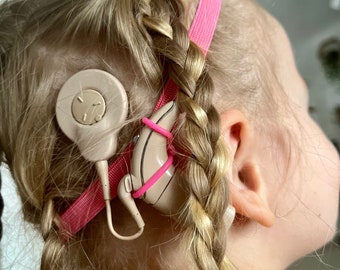 Diadema rosa antideslizante para implante auditivo Barbie con presillas de goma