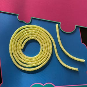 Plastic protective 30cm long cable (yellow) for the protection of hearing implants and hearing aids