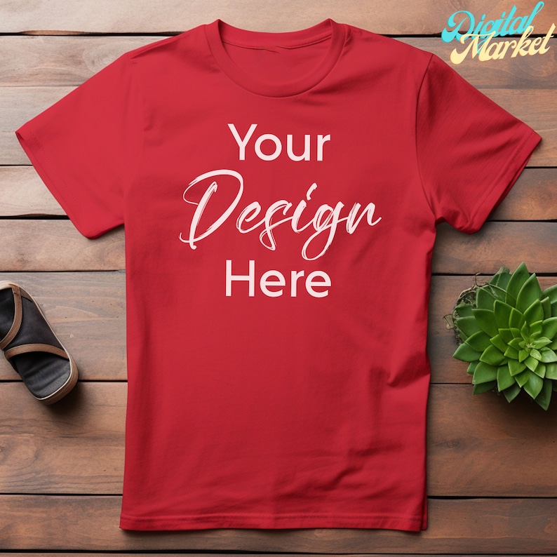 Puede incluir: Camiseta roja con el texto "Your Design Here" impreso en blanco en la parte delantera.