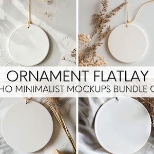 May include: Four white round ceramic ornaments with gold string hanging from them. The ornaments are on a white marble background with dried flowers and plants. The text "ORNAMENT FLATLAY BOHO MINIMALIST MOCKUPS BUNDLE OF 4" is at the top of the image.