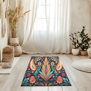 May include: A colorful rug with a paisley design in shades of blue, orange, yellow, and green. The rug has a dark background and features intricate floral patterns.