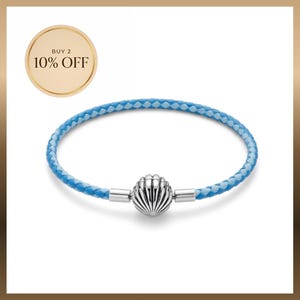 Pulseira trançada azul oceano estilo Pandora com fecho em formato de concha estilo prata | Joias minimalistas com inspiração praiana