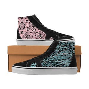 May include: A pair of black high-top trainers with a white sole. One shoe features a pink and black floral pattern, while the other has a blue and black geometric pattern. The text "Real Milwaukee" is printed on the side of the shoe with the geometric pattern.
