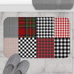 May include: A bath mat with a patchwork design featuring various patterns in black, white, red, and green. The patterns include plaid, gingham, houndstooth, and checkered.
